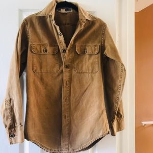 A vintage Patagonia longsleeved canvas work wear shirt.